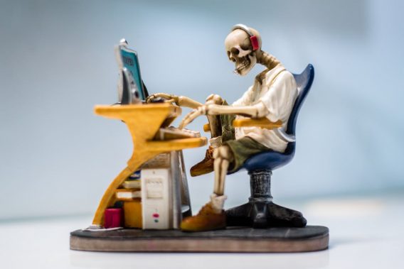 skeleton at desk for customer service.