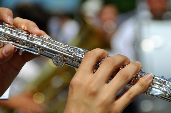 woman playing instrument