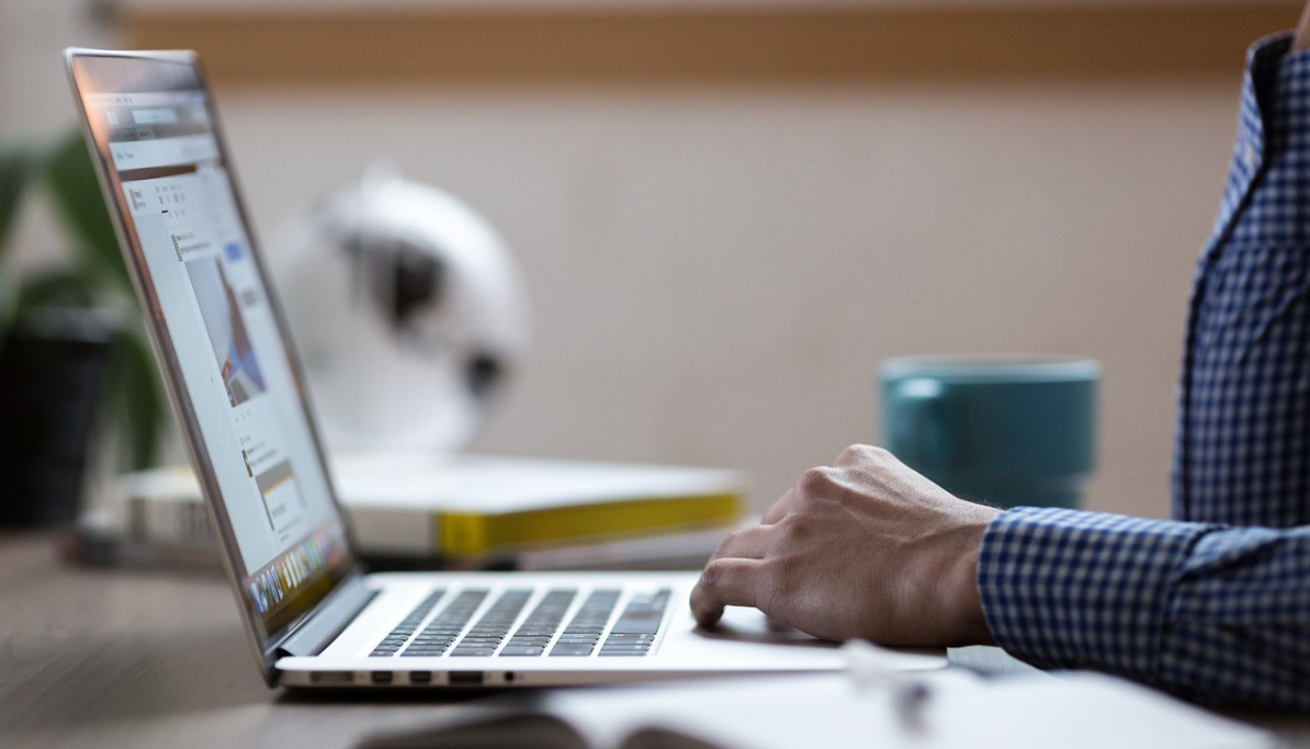 person using laptop