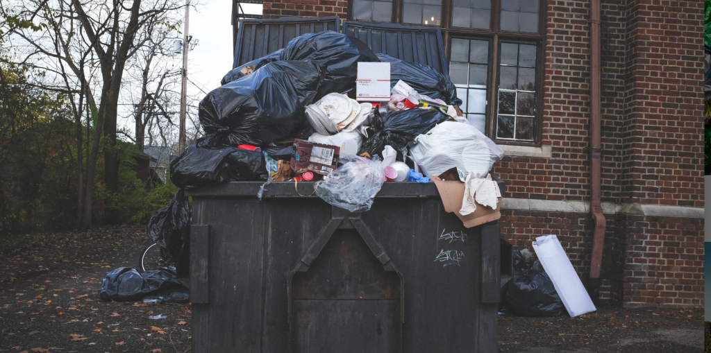 garbage overflowing from bin.