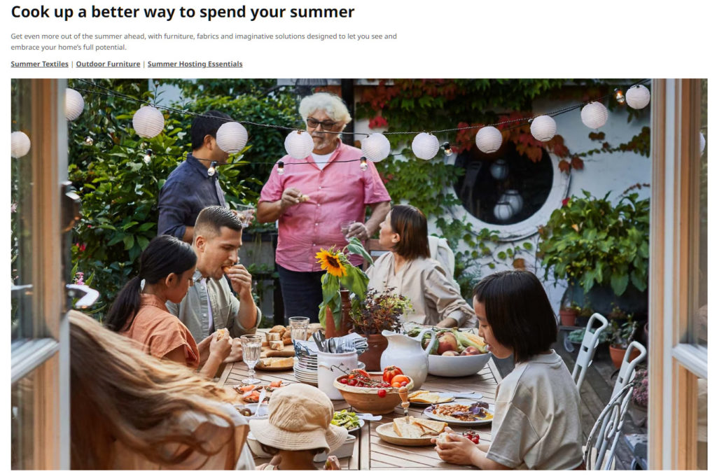 A screenshot of an IKEA ad. It shows a multi-generational family gathered around a decorated table on a patio. The heading reads Cook up a better way to spend your summer.